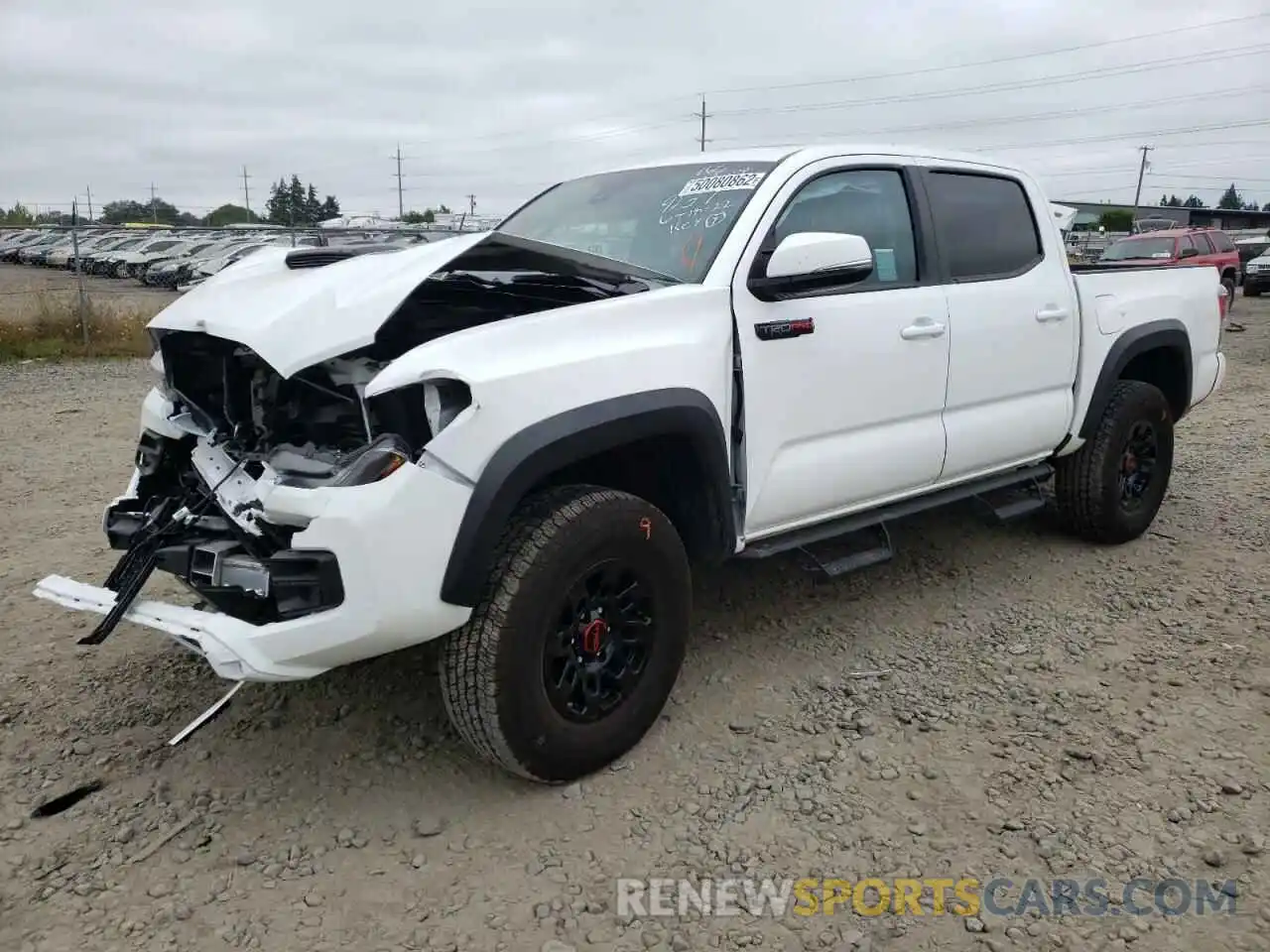 2 Photograph of a damaged car 5TFCZ5AN5KX206158 TOYOTA TACOMA 2019