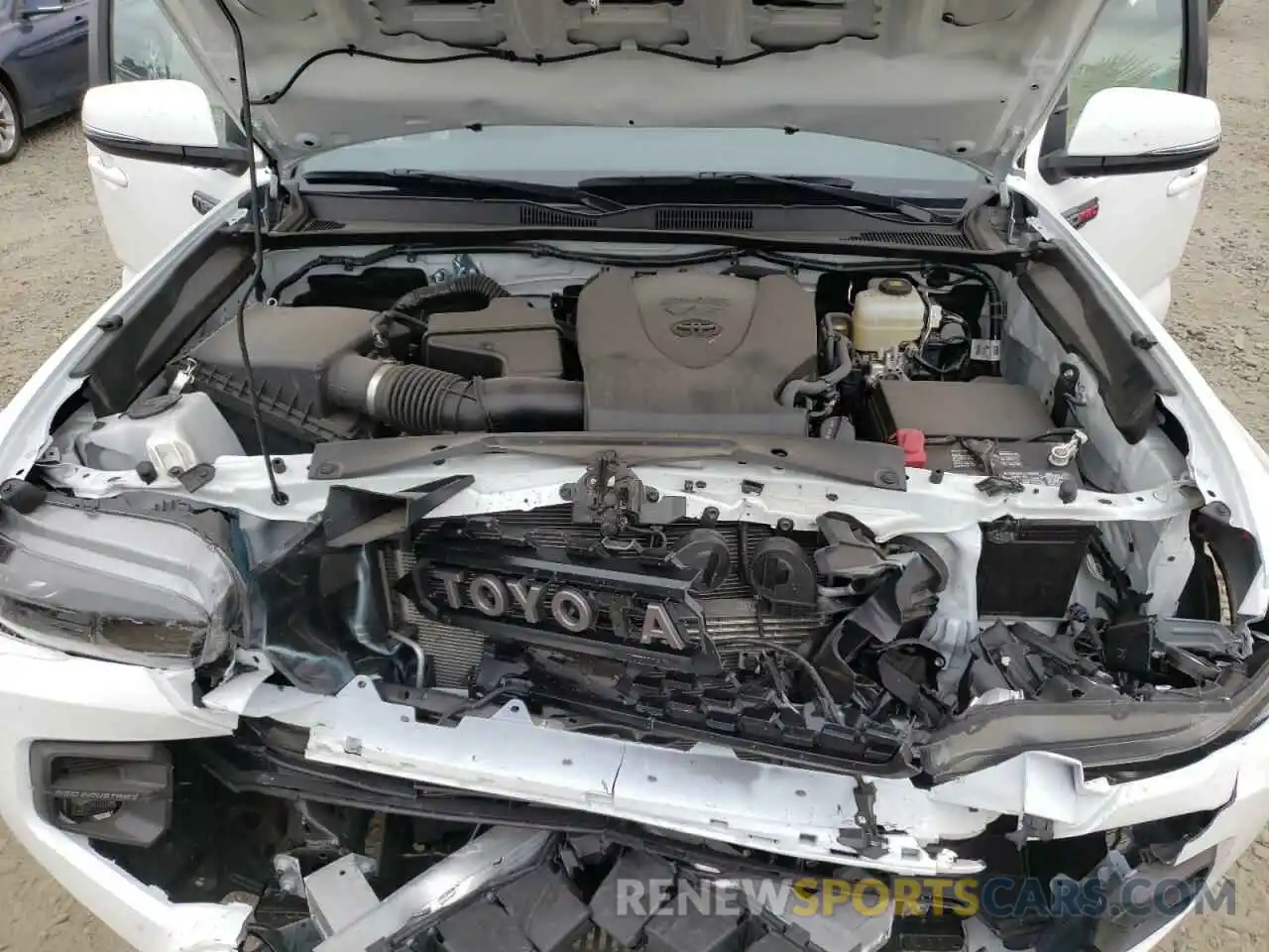 7 Photograph of a damaged car 5TFCZ5AN5KX206158 TOYOTA TACOMA 2019