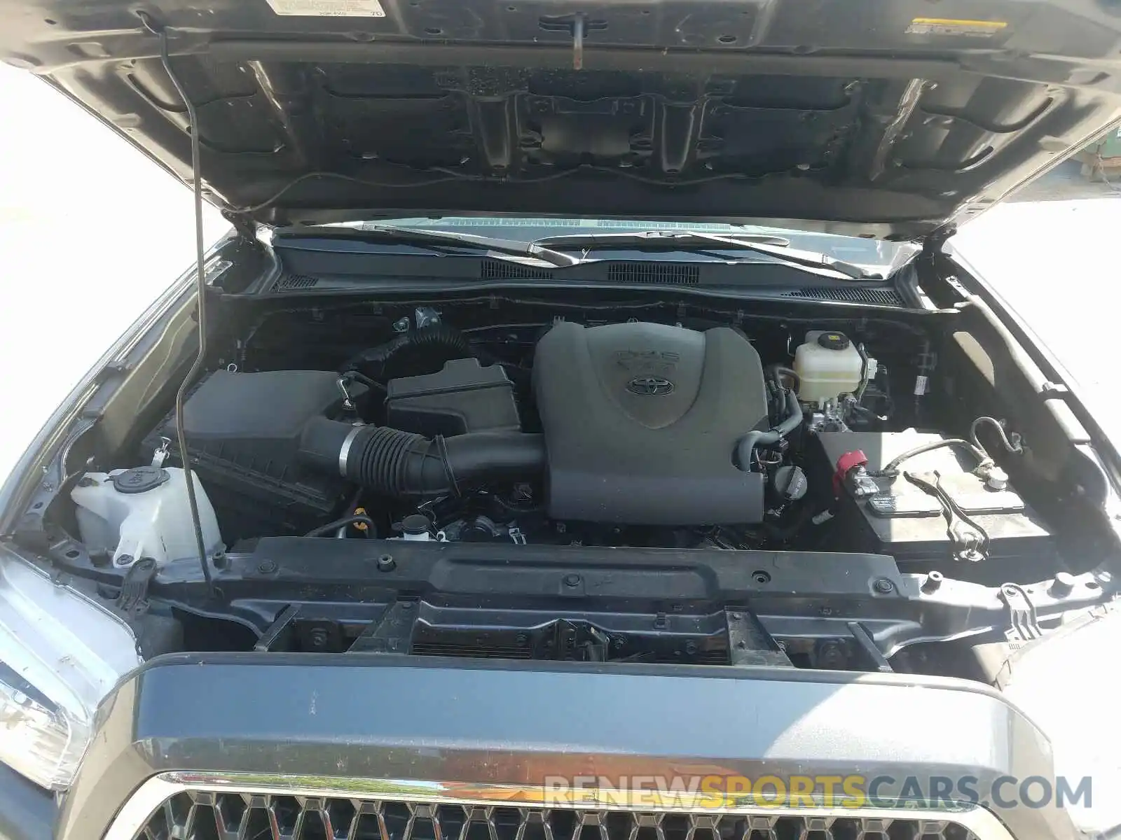 7 Photograph of a damaged car 5TFCZ5AN5KX206676 TOYOTA TACOMA 2019