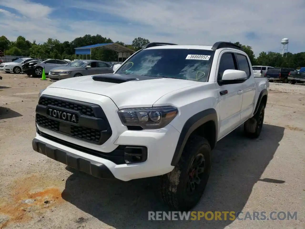 2 Photograph of a damaged car 5TFCZ5AN5KX209514 TOYOTA TACOMA 2019