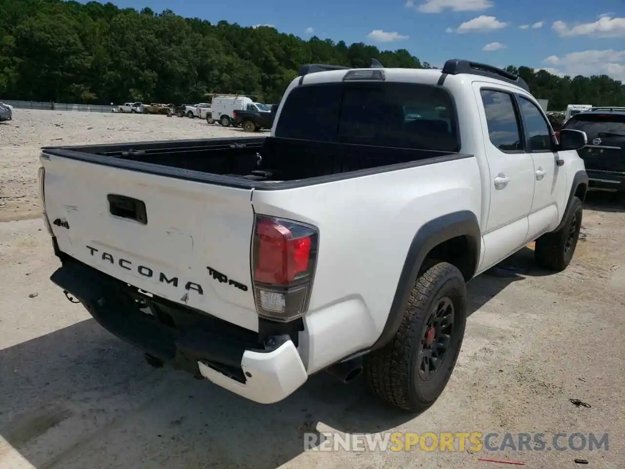 4 Photograph of a damaged car 5TFCZ5AN5KX209514 TOYOTA TACOMA 2019