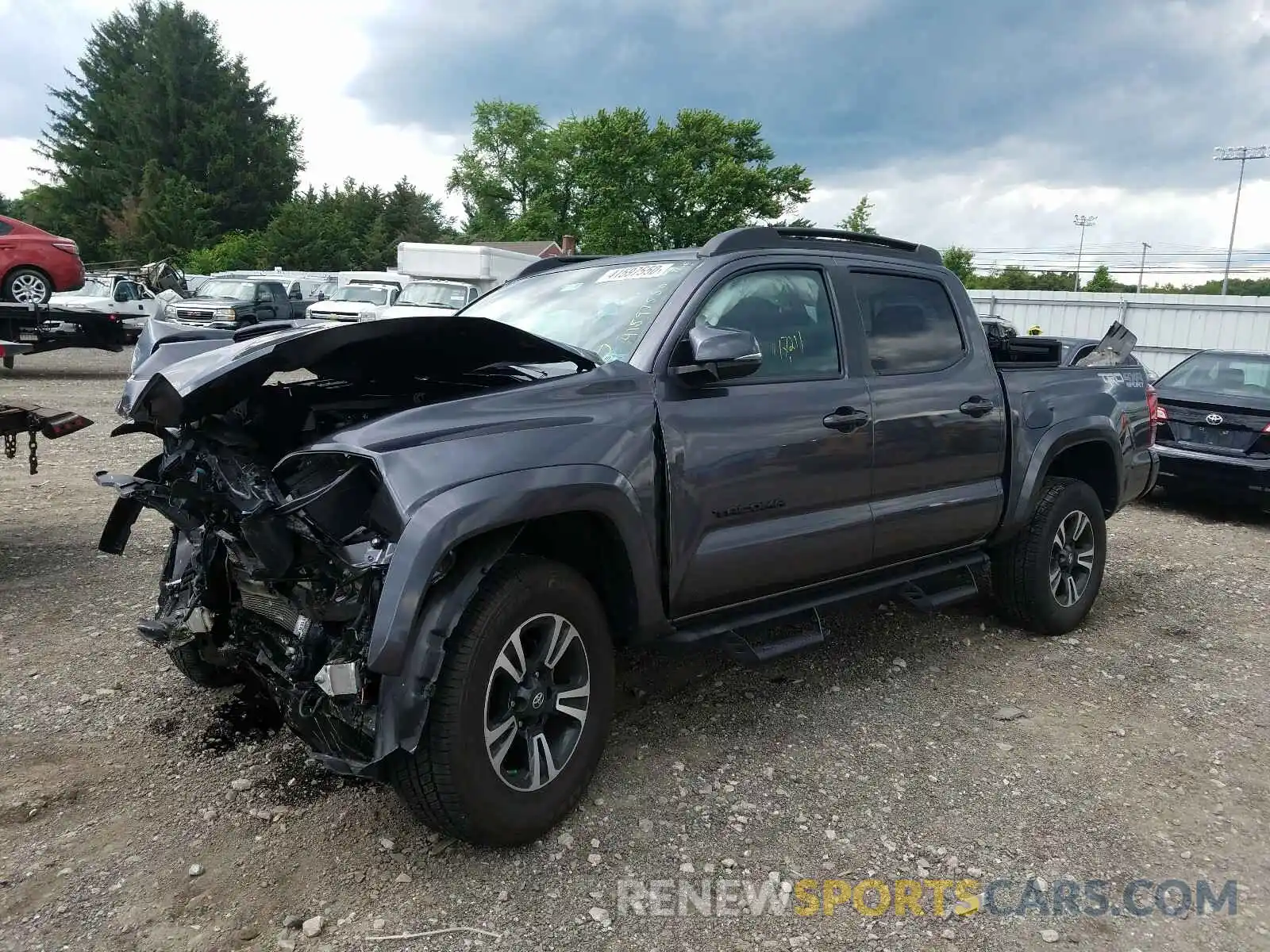 2 Photograph of a damaged car 5TFCZ5AN5KX211912 TOYOTA TACOMA 2019