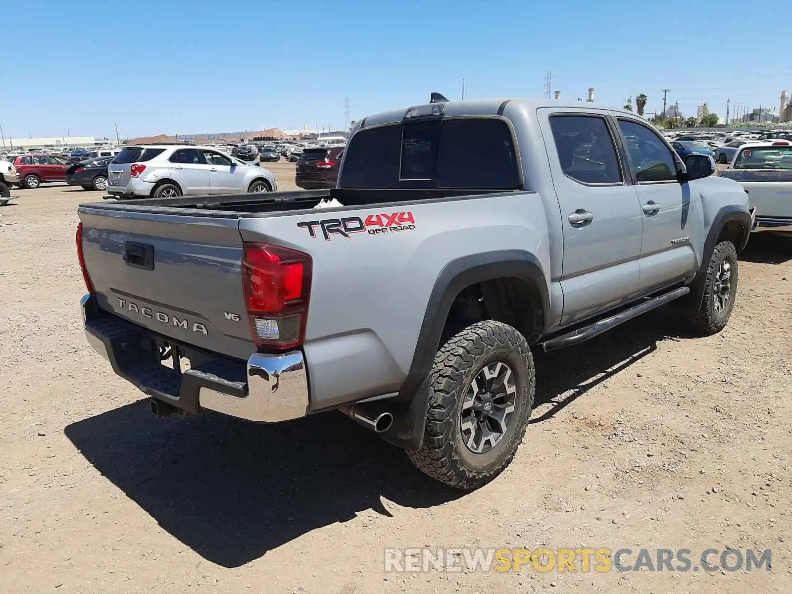 4 Photograph of a damaged car 5TFCZ5AN6KX168231 TOYOTA TACOMA 2019