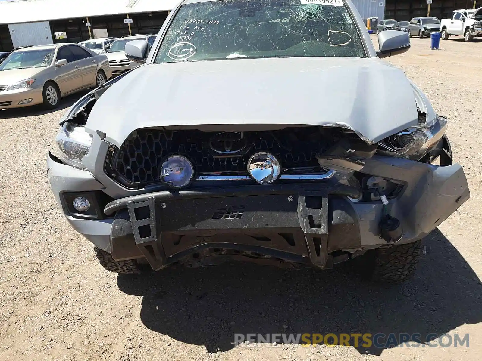 9 Photograph of a damaged car 5TFCZ5AN6KX168231 TOYOTA TACOMA 2019