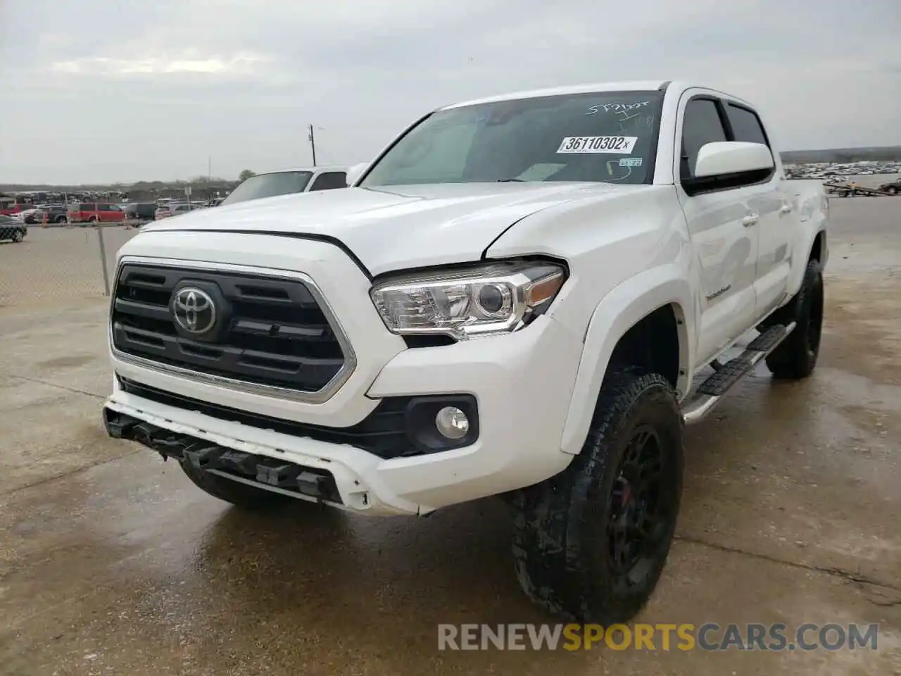 2 Photograph of a damaged car 5TFCZ5AN6KX168696 TOYOTA TACOMA 2019