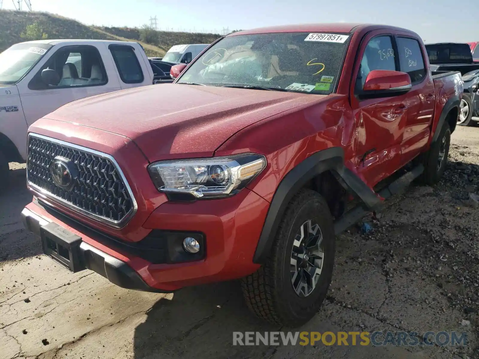 2 Photograph of a damaged car 5TFCZ5AN6KX169041 TOYOTA TACOMA 2019