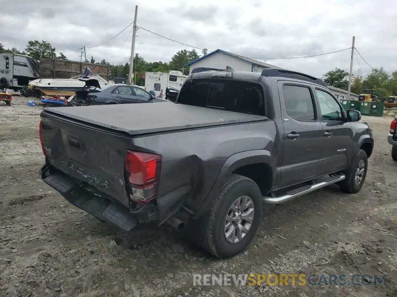 4 Photograph of a damaged car 5TFCZ5AN6KX169802 TOYOTA TACOMA 2019