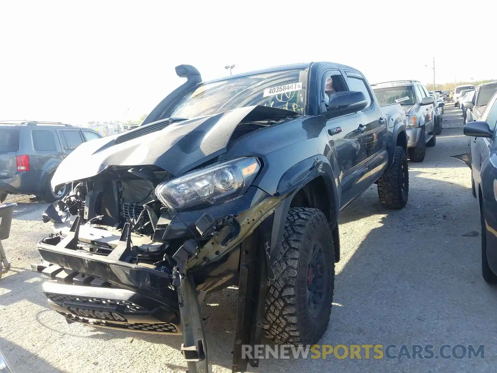 2 Photograph of a damaged car 5TFCZ5AN6KX173834 TOYOTA TACOMA 2019