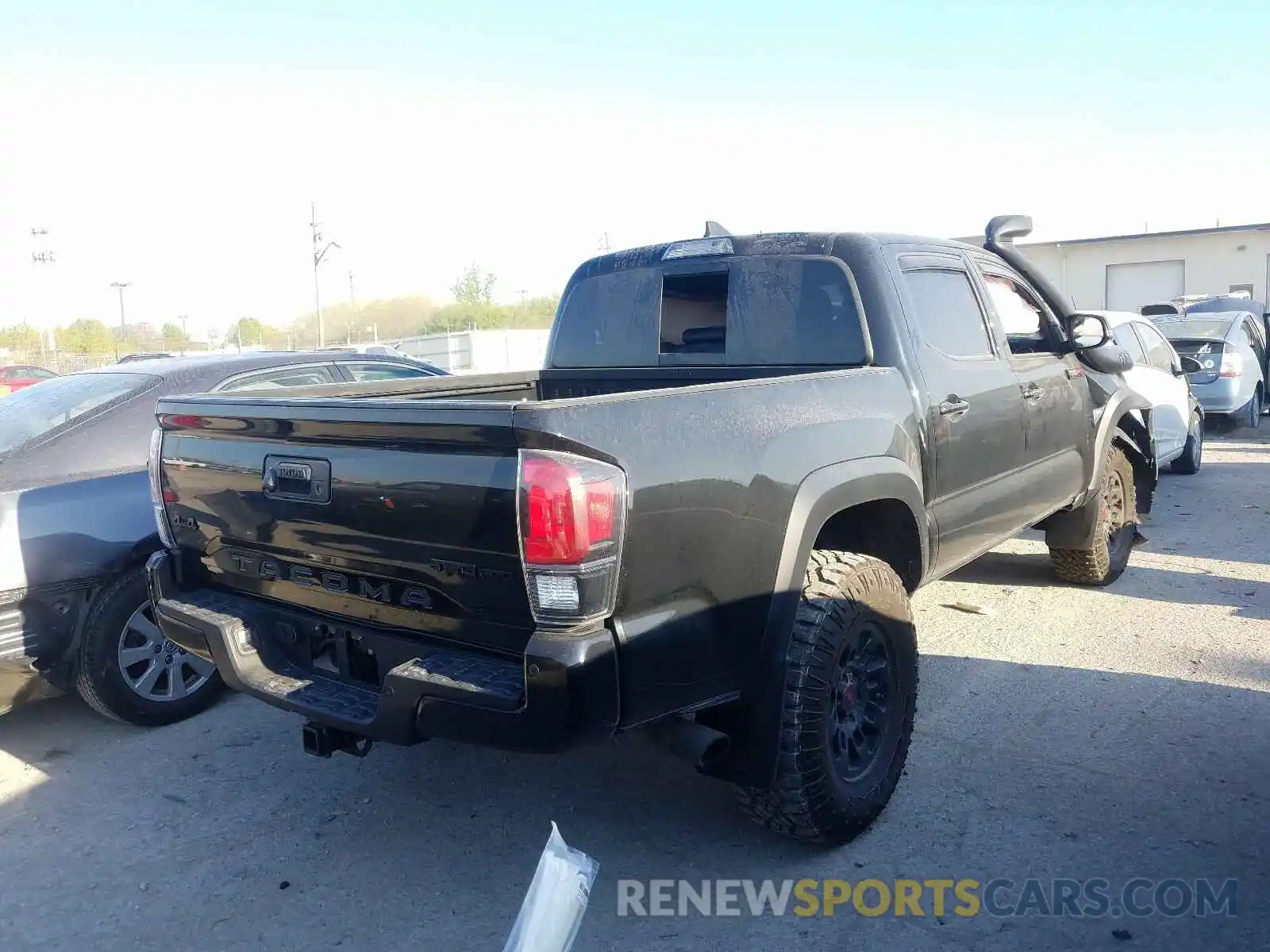 4 Photograph of a damaged car 5TFCZ5AN6KX173834 TOYOTA TACOMA 2019