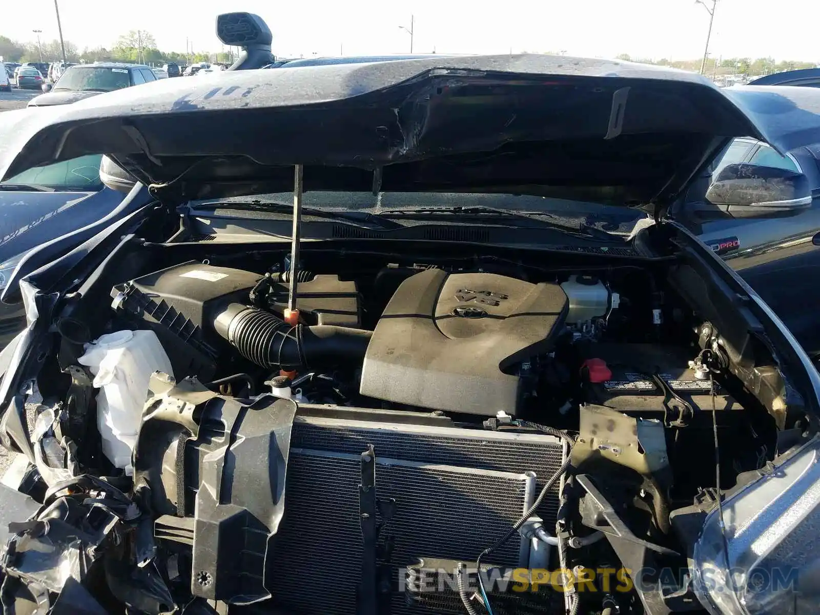 7 Photograph of a damaged car 5TFCZ5AN6KX173834 TOYOTA TACOMA 2019