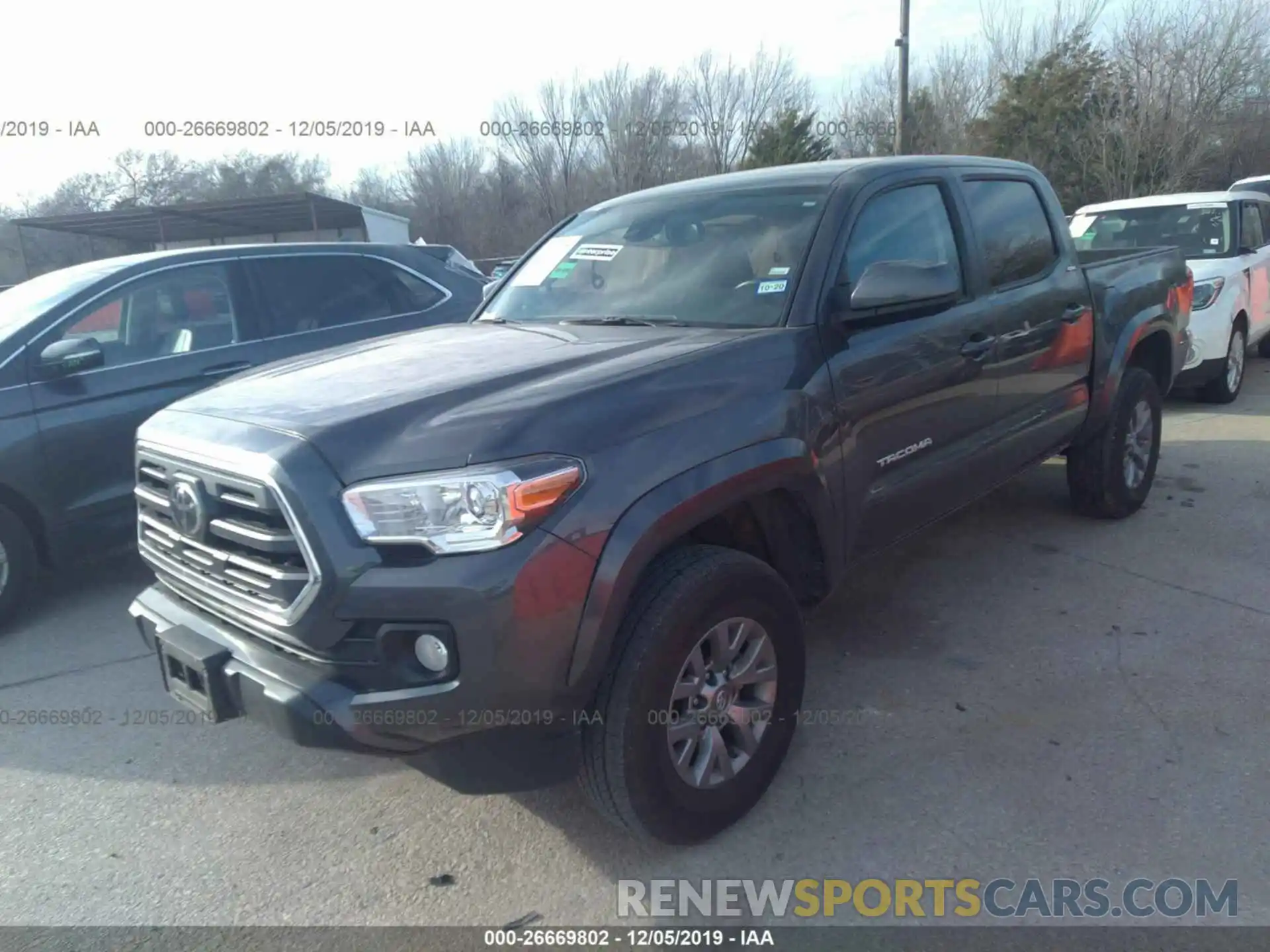 2 Photograph of a damaged car 5TFCZ5AN6KX174482 TOYOTA TACOMA 2019