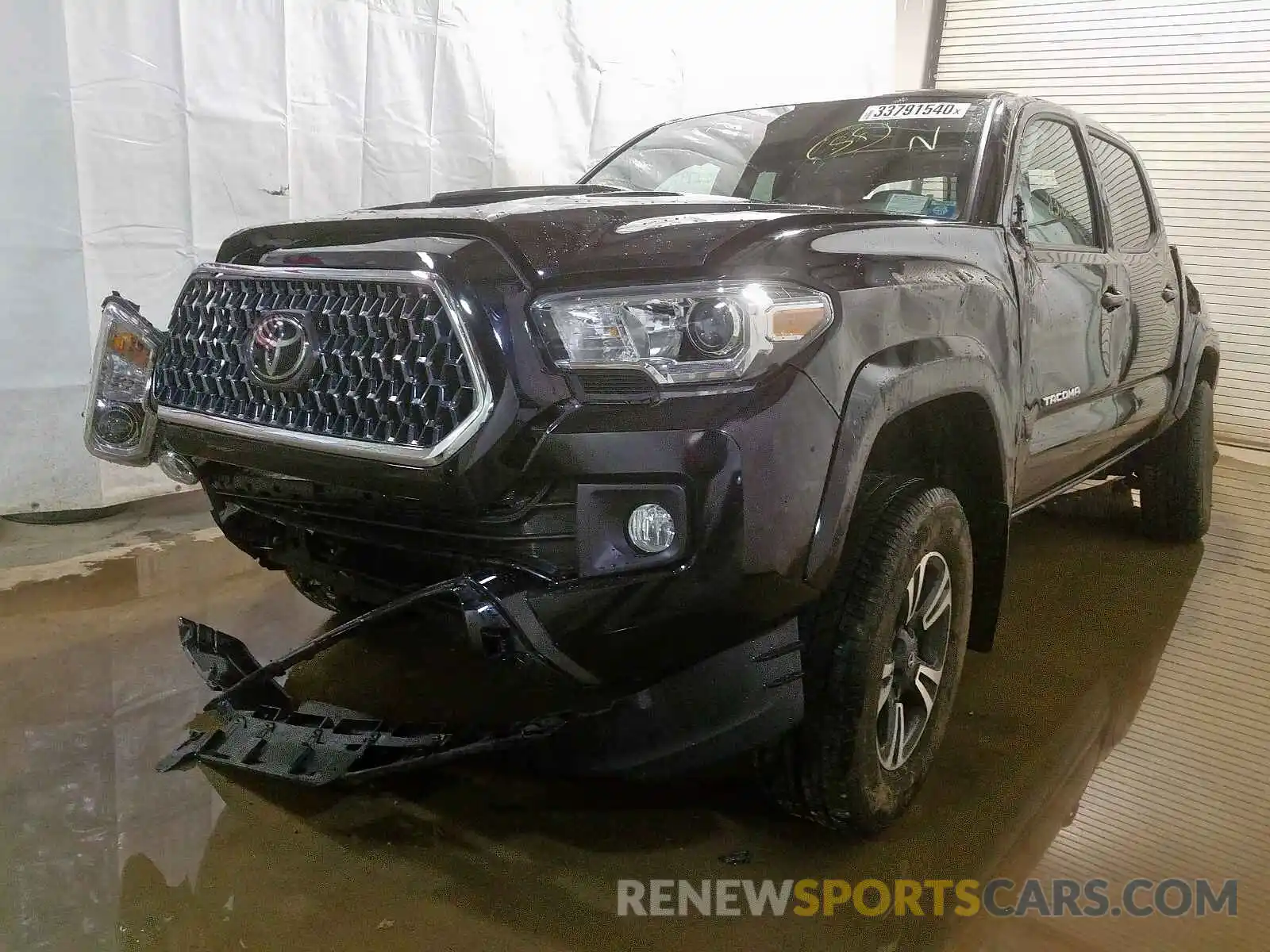 2 Photograph of a damaged car 5TFCZ5AN6KX177656 TOYOTA TACOMA 2019