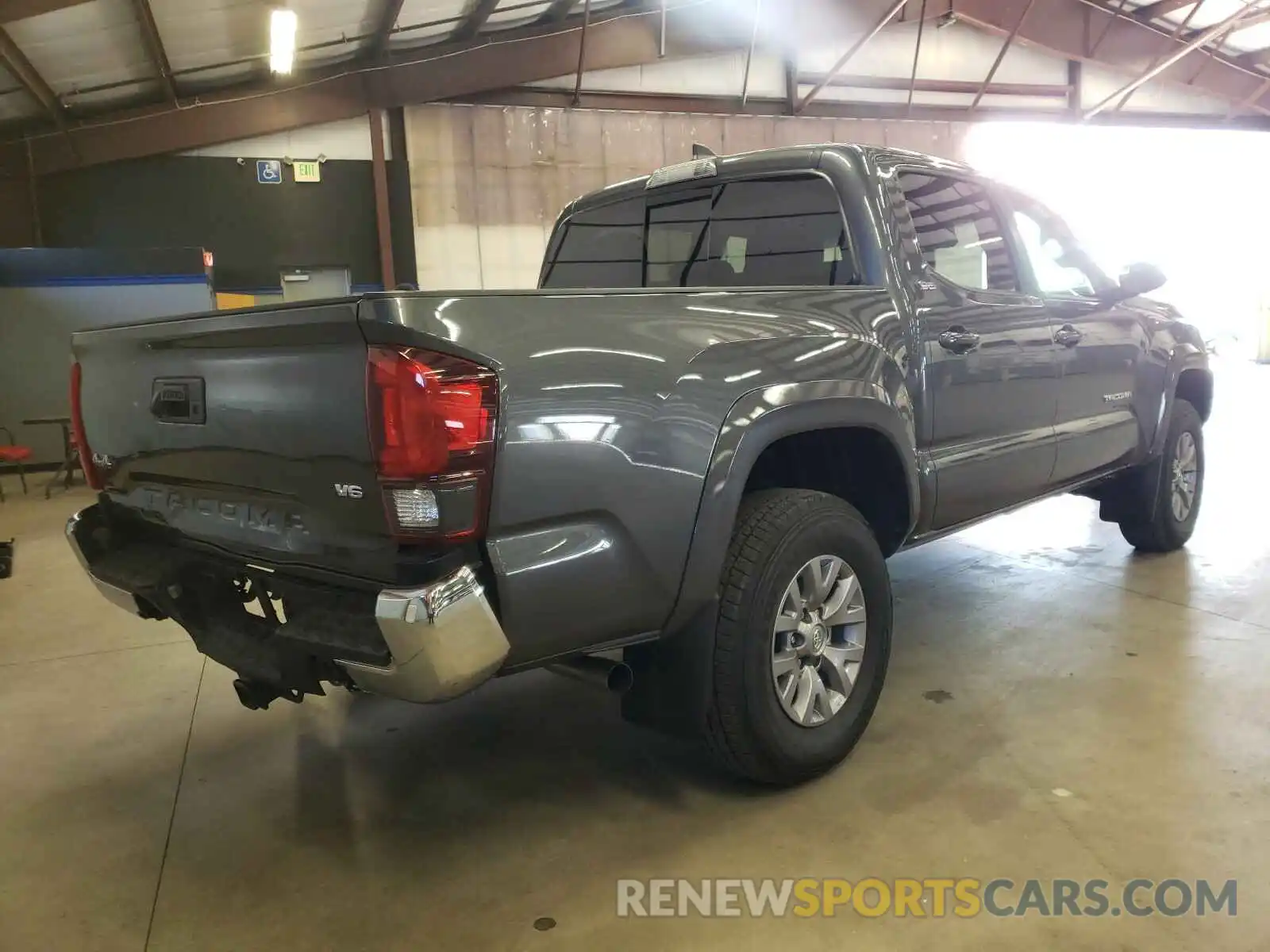 4 Photograph of a damaged car 5TFCZ5AN6KX179617 TOYOTA TACOMA 2019