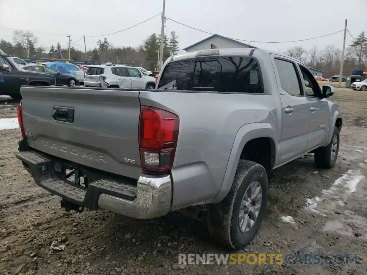 4 Photograph of a damaged car 5TFCZ5AN6KX182985 TOYOTA TACOMA 2019