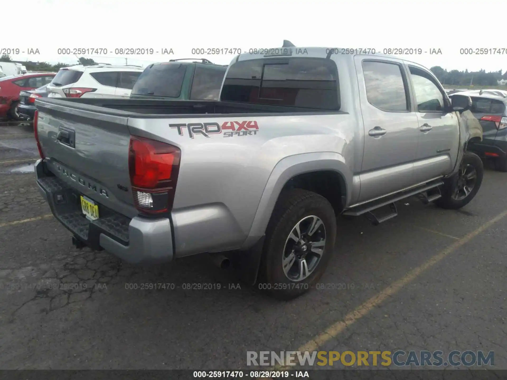 4 Photograph of a damaged car 5TFCZ5AN6KX183750 TOYOTA TACOMA 2019