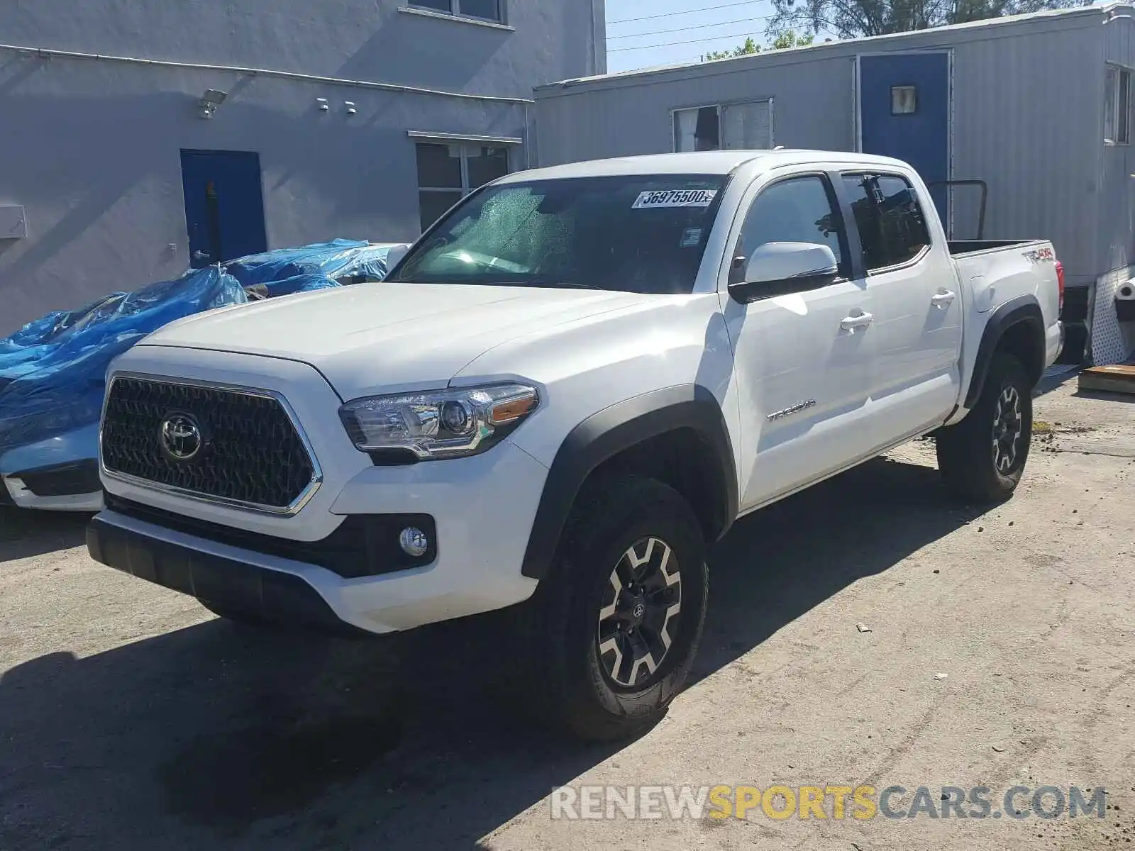 2 Photograph of a damaged car 5TFCZ5AN6KX185014 TOYOTA TACOMA 2019