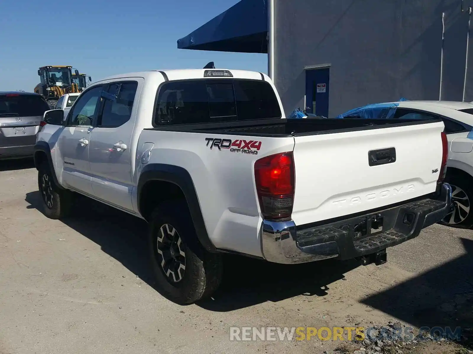 3 Photograph of a damaged car 5TFCZ5AN6KX185014 TOYOTA TACOMA 2019