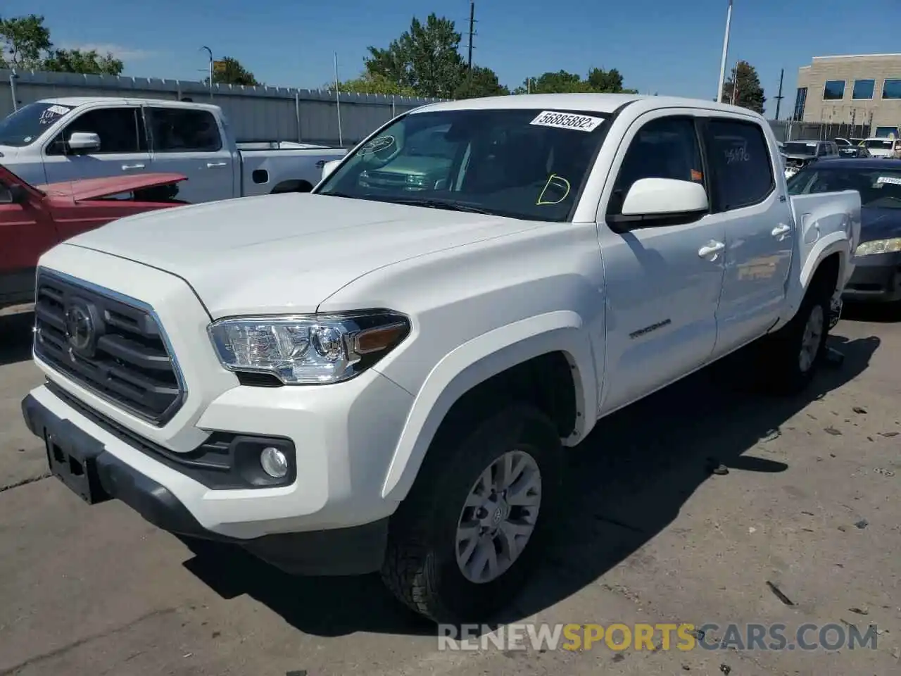 2 Photograph of a damaged car 5TFCZ5AN6KX185353 TOYOTA TACOMA 2019