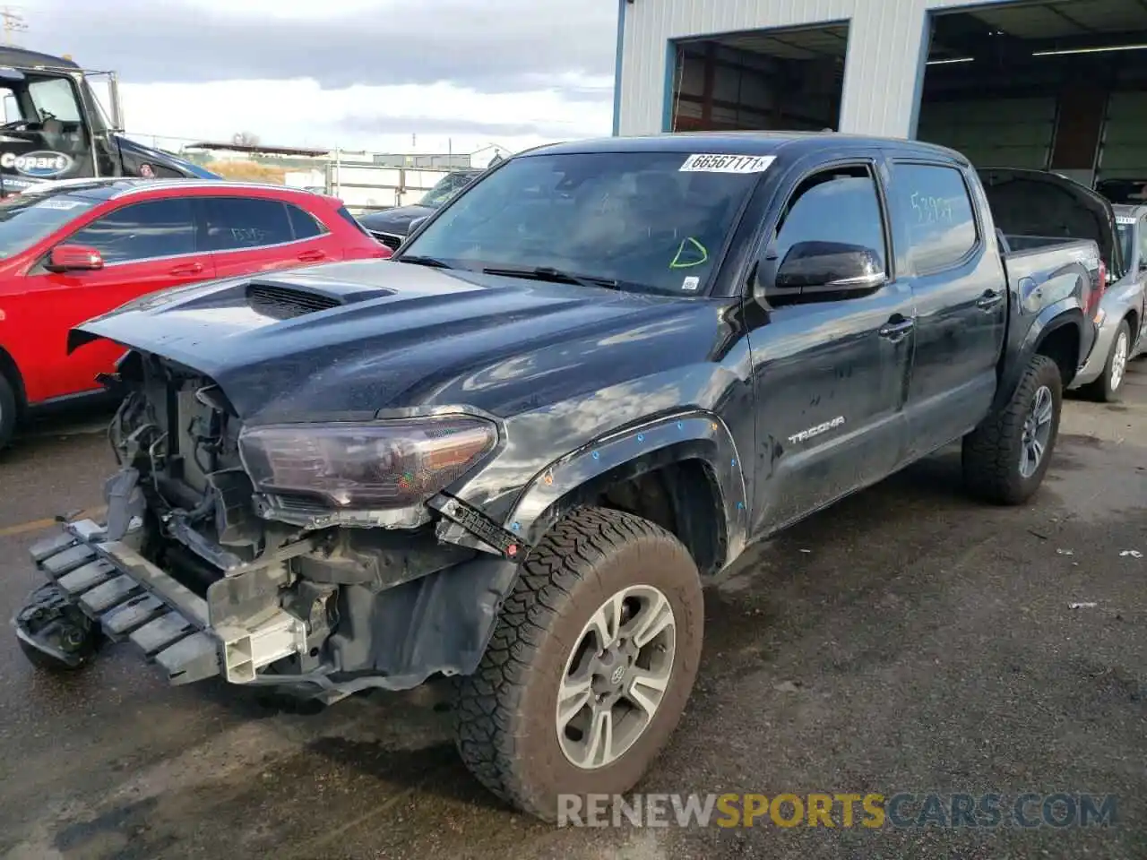 2 Photograph of a damaged car 5TFCZ5AN6KX185787 TOYOTA TACOMA 2019