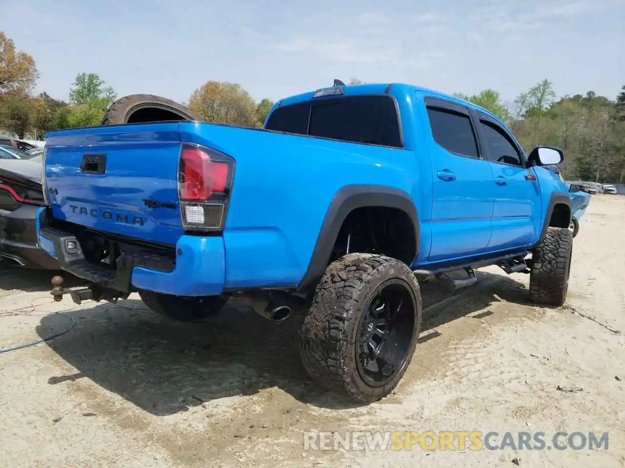 4 Photograph of a damaged car 5TFCZ5AN6KX185823 TOYOTA TACOMA 2019