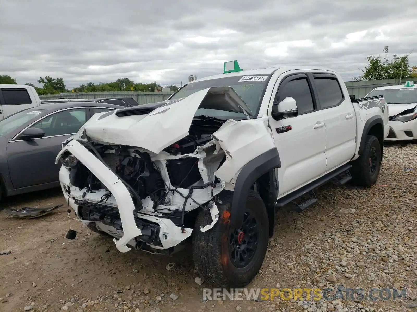 2 Photograph of a damaged car 5TFCZ5AN6KX189225 TOYOTA TACOMA 2019