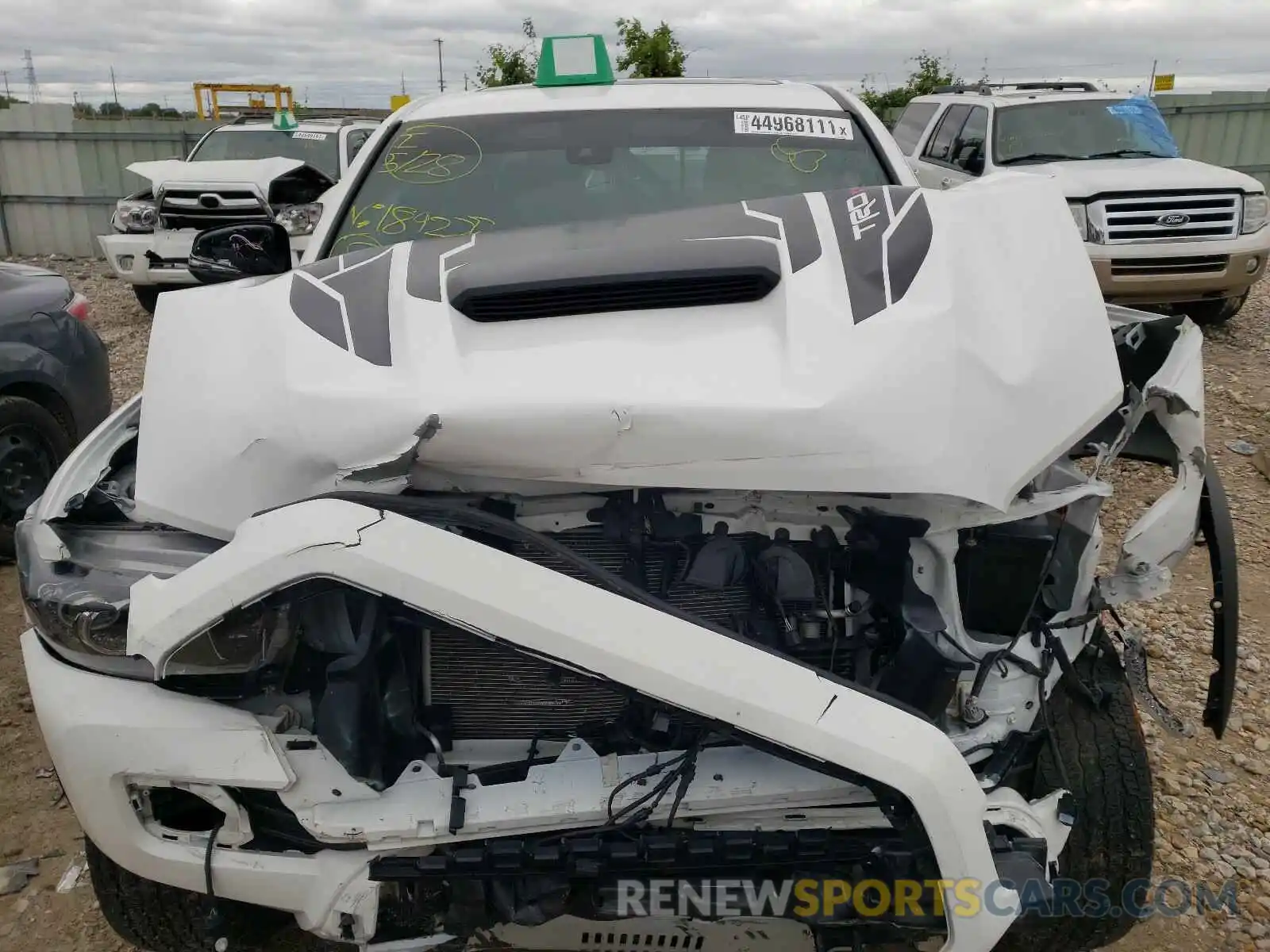 7 Photograph of a damaged car 5TFCZ5AN6KX189225 TOYOTA TACOMA 2019