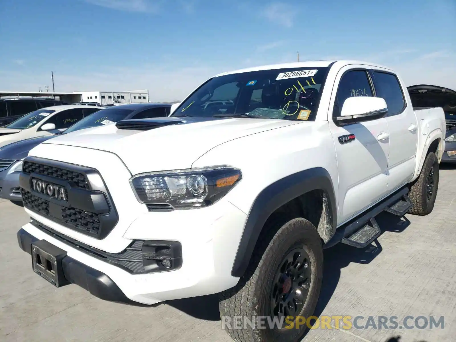 2 Photograph of a damaged car 5TFCZ5AN6KX189841 TOYOTA TACOMA 2019