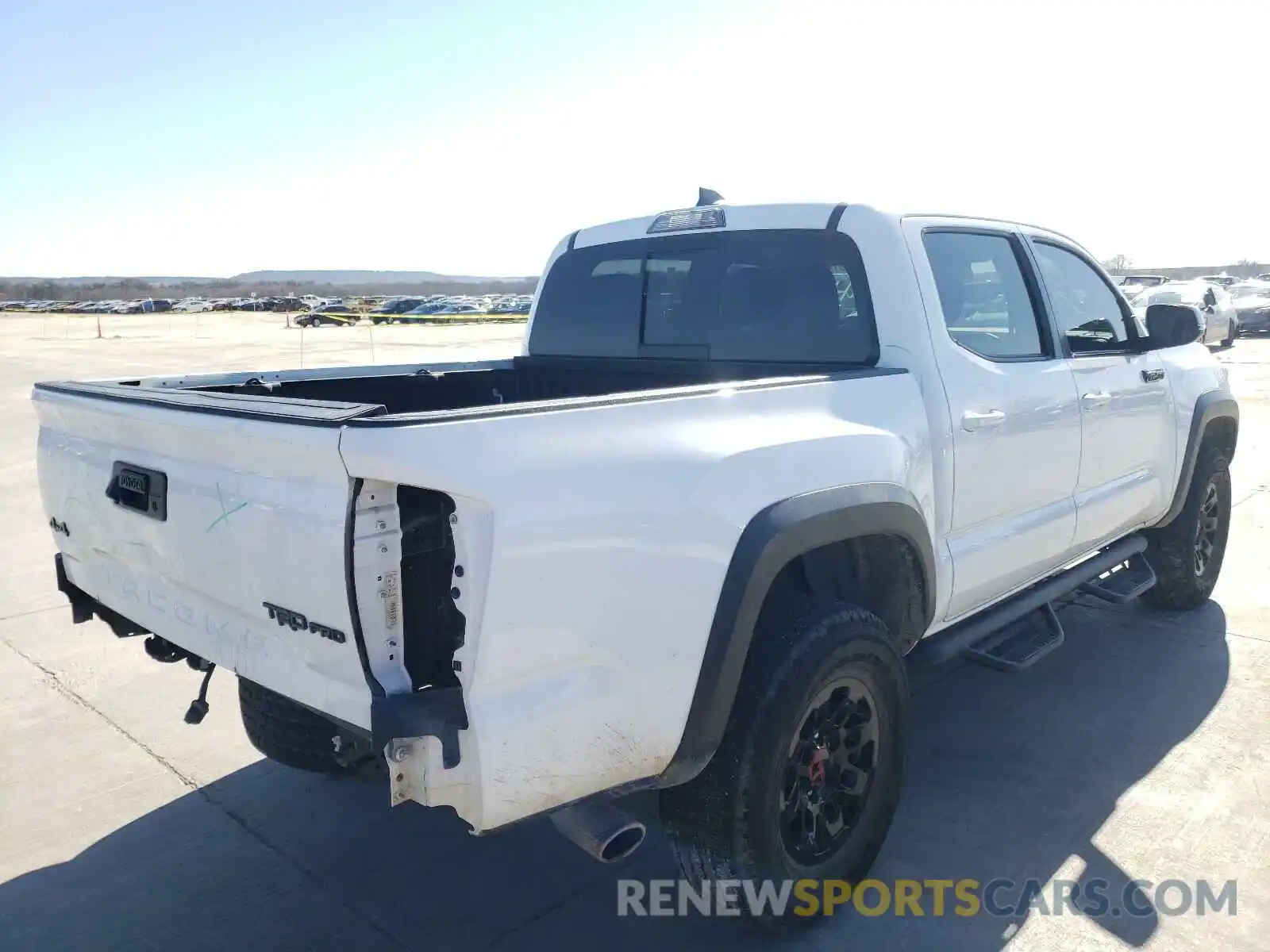 4 Photograph of a damaged car 5TFCZ5AN6KX189841 TOYOTA TACOMA 2019