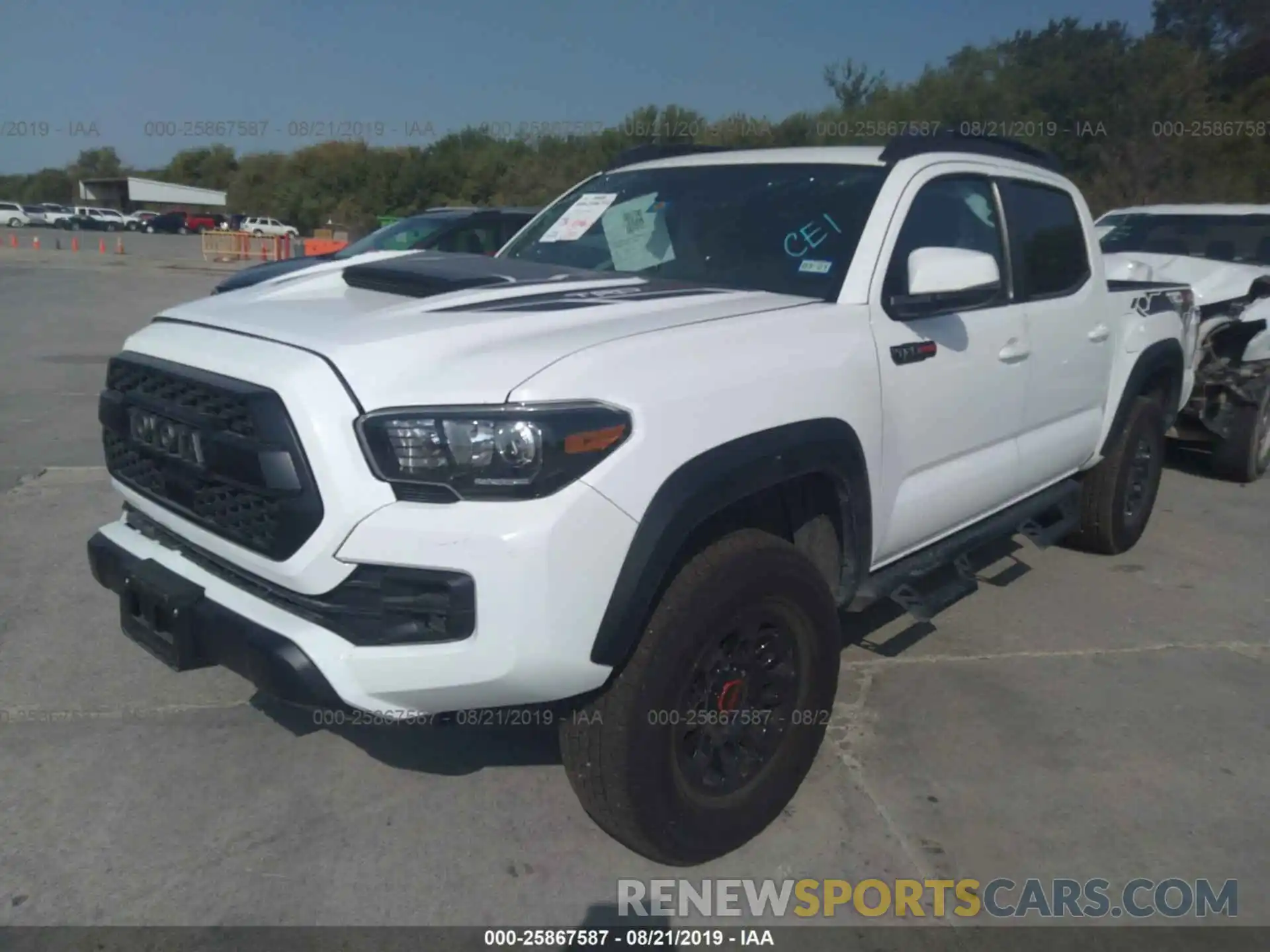 2 Photograph of a damaged car 5TFCZ5AN6KX191833 TOYOTA TACOMA 2019