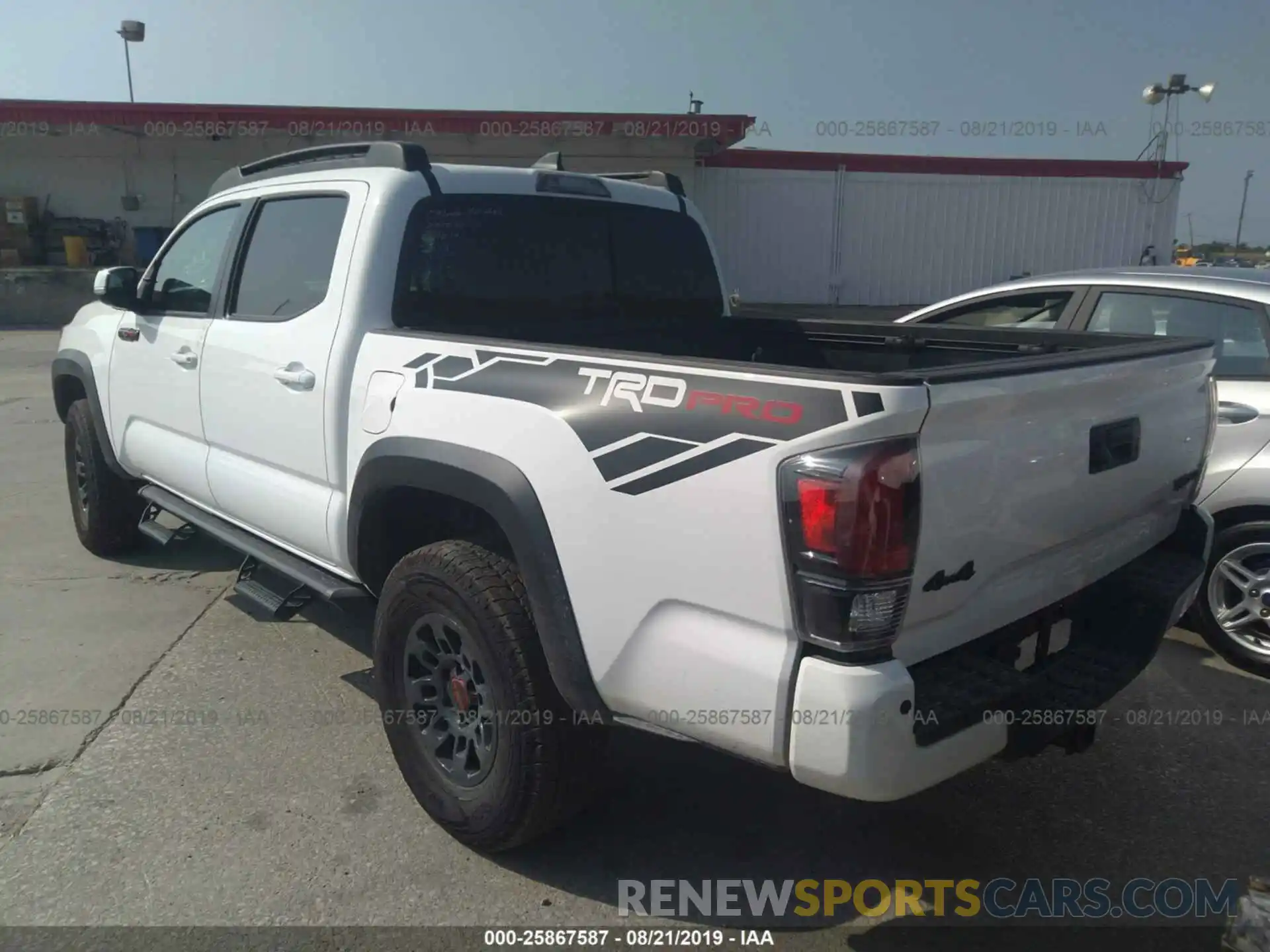 3 Photograph of a damaged car 5TFCZ5AN6KX191833 TOYOTA TACOMA 2019