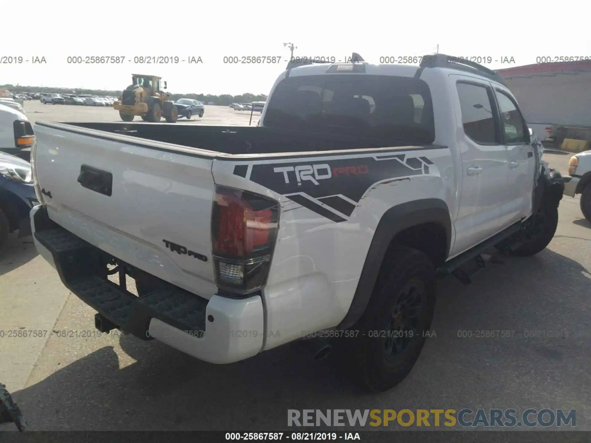 4 Photograph of a damaged car 5TFCZ5AN6KX191833 TOYOTA TACOMA 2019