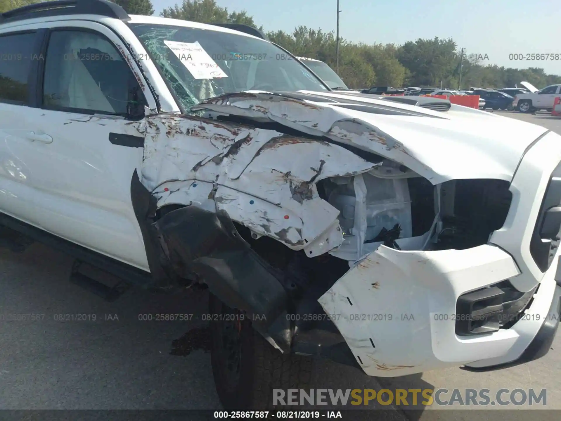 6 Photograph of a damaged car 5TFCZ5AN6KX191833 TOYOTA TACOMA 2019