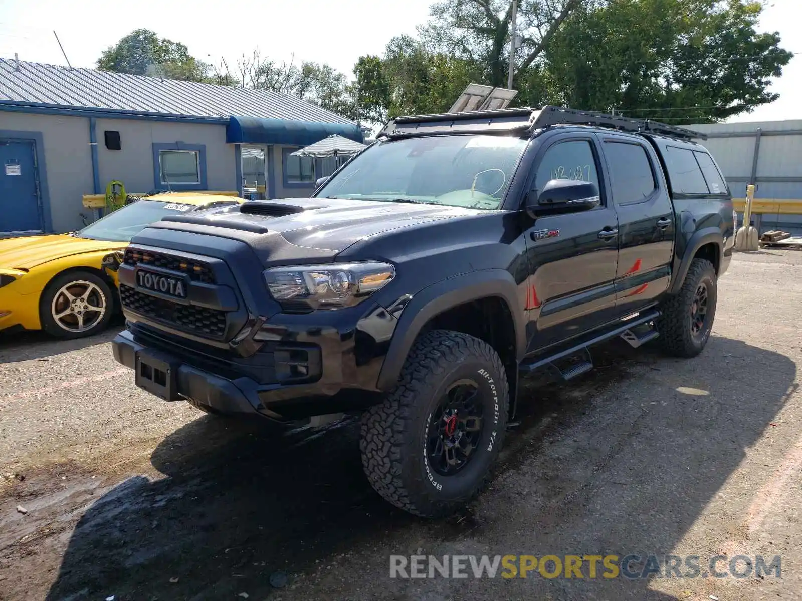 2 Photograph of a damaged car 5TFCZ5AN6KX193405 TOYOTA TACOMA 2019