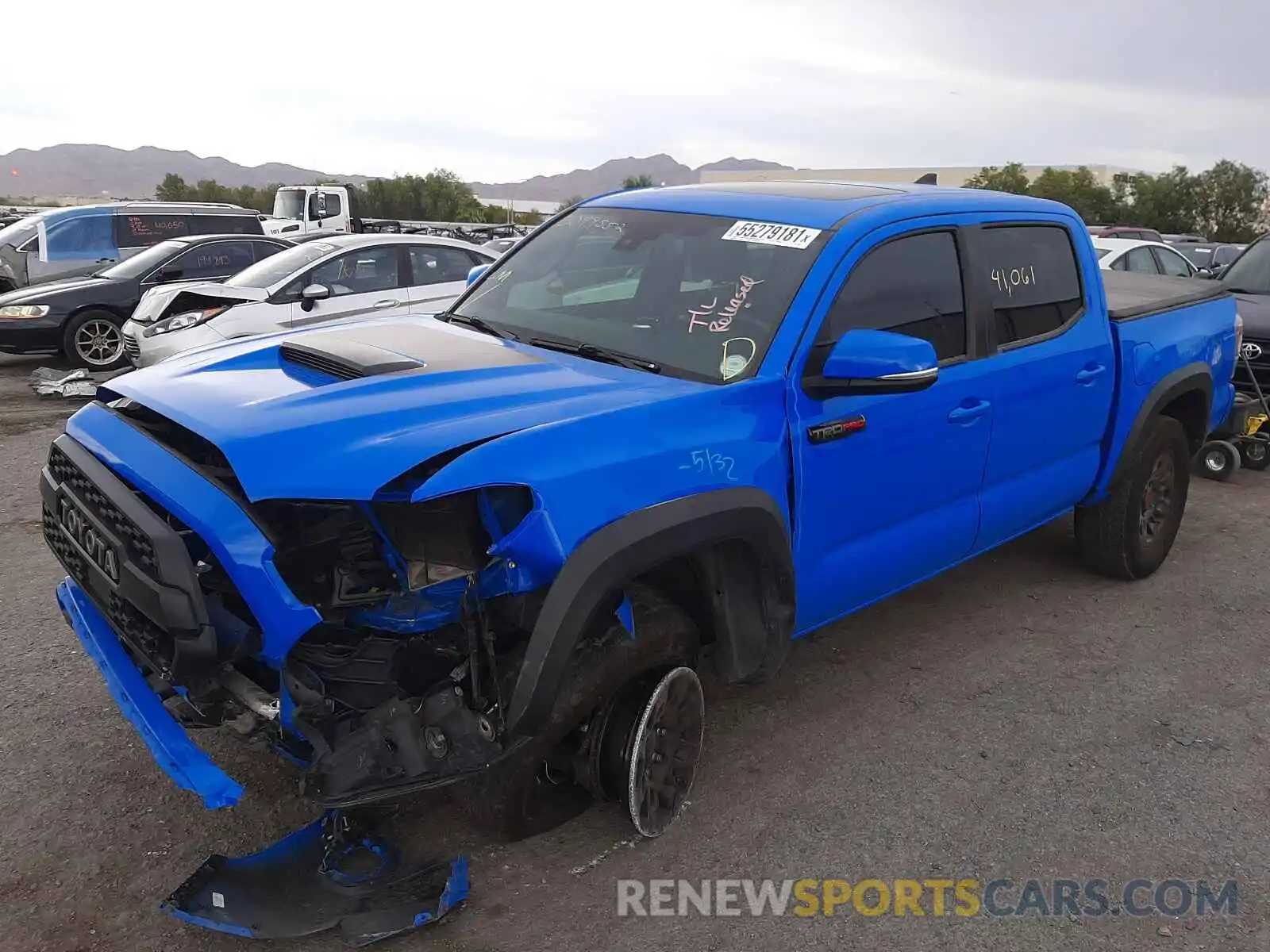 2 Photograph of a damaged car 5TFCZ5AN6KX201874 TOYOTA TACOMA 2019