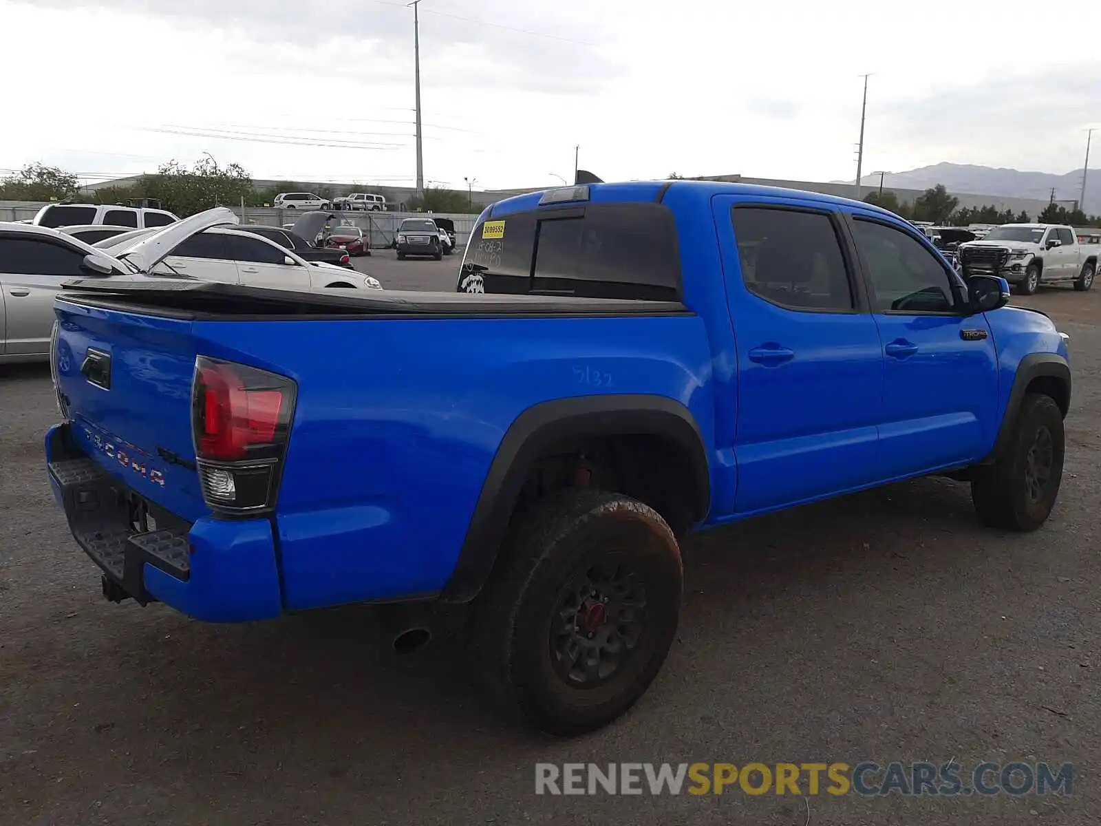 4 Photograph of a damaged car 5TFCZ5AN6KX201874 TOYOTA TACOMA 2019