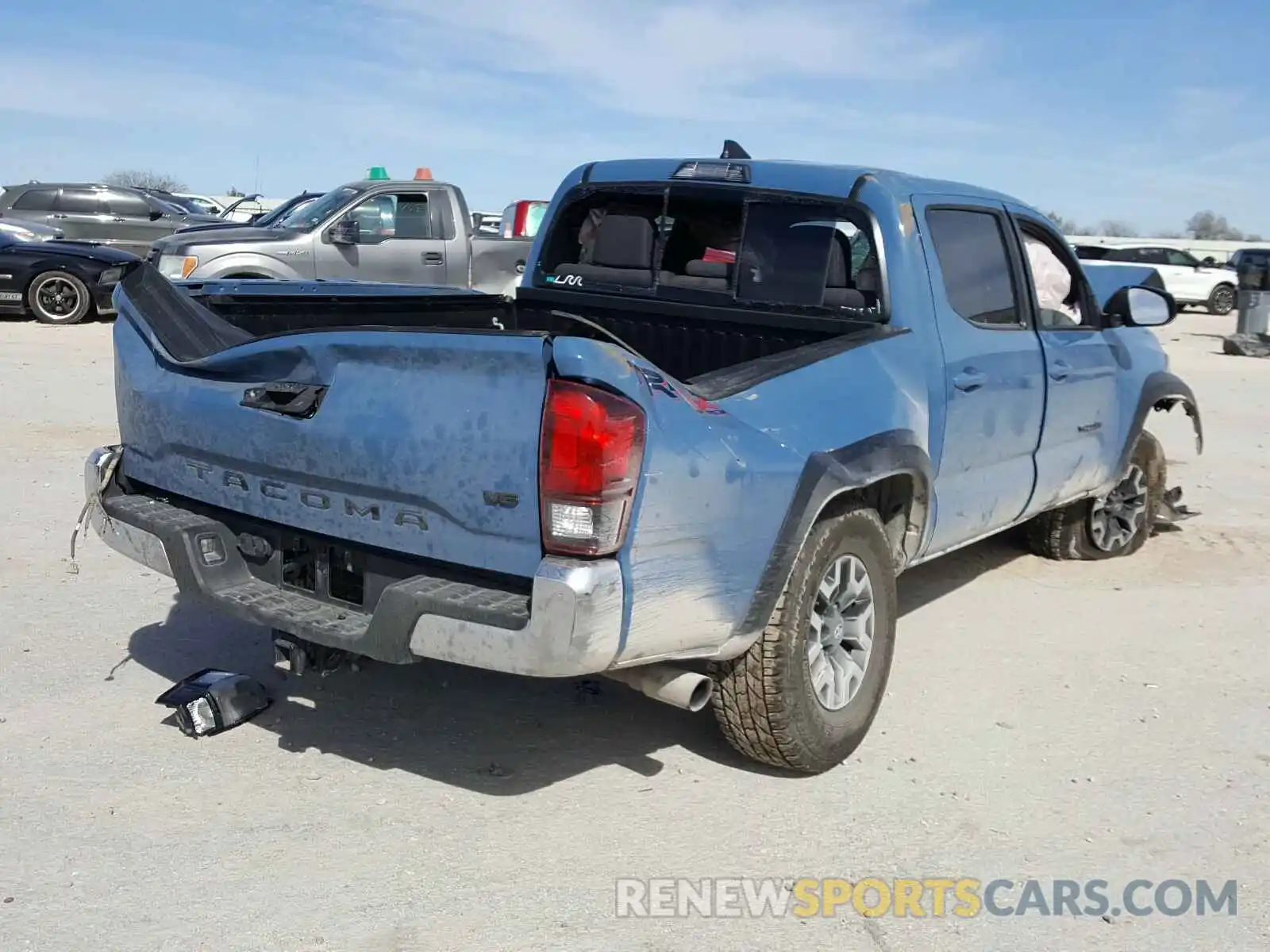 4 Photograph of a damaged car 5TFCZ5AN6KX204953 TOYOTA TACOMA 2019