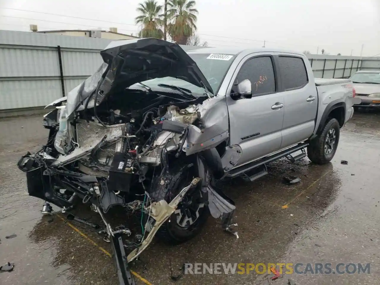 2 Photograph of a damaged car 5TFCZ5AN6KX208310 TOYOTA TACOMA 2019