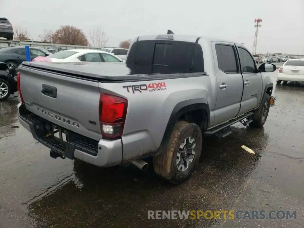 4 Photograph of a damaged car 5TFCZ5AN6KX208310 TOYOTA TACOMA 2019