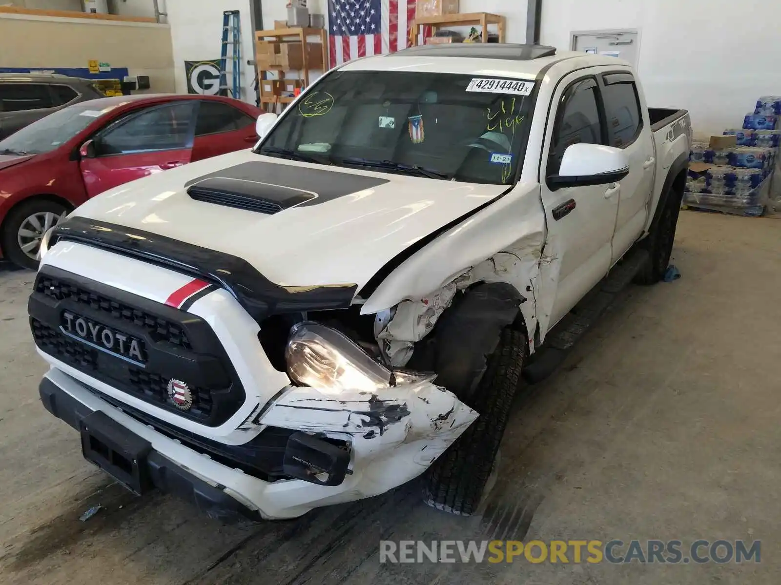 2 Photograph of a damaged car 5TFCZ5AN6KX211496 TOYOTA TACOMA 2019