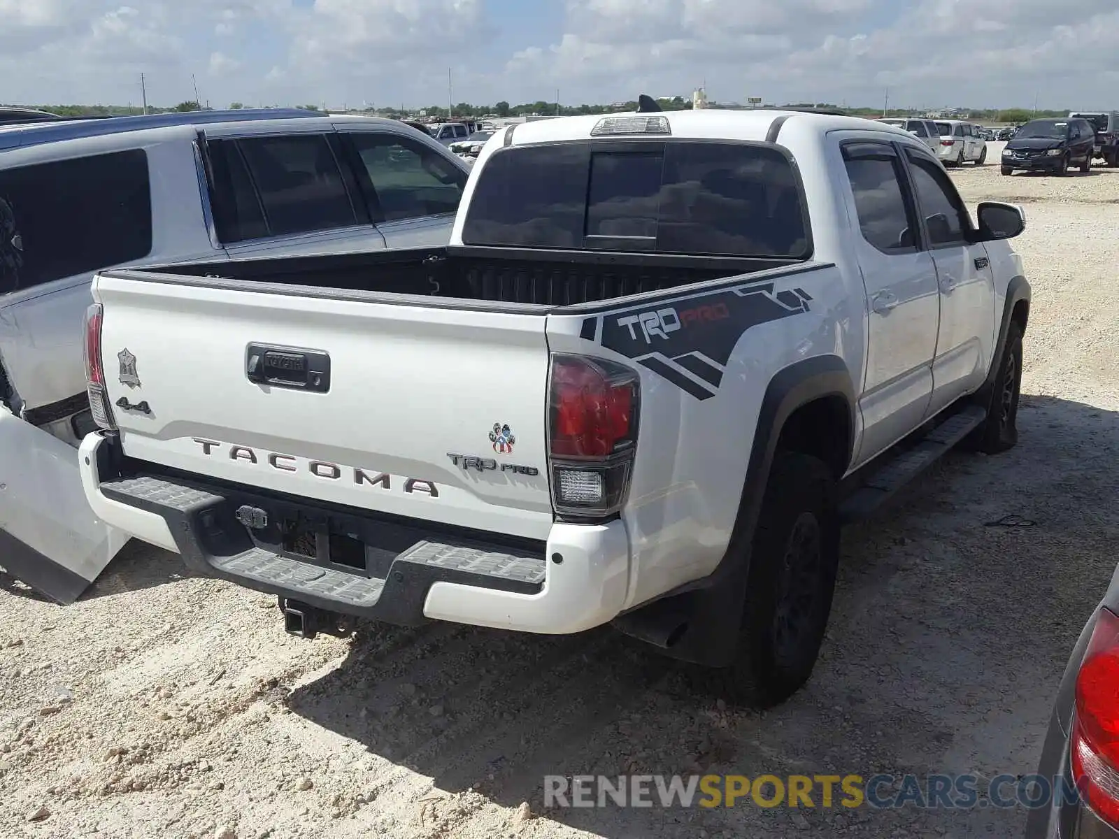 4 Photograph of a damaged car 5TFCZ5AN6KX211496 TOYOTA TACOMA 2019