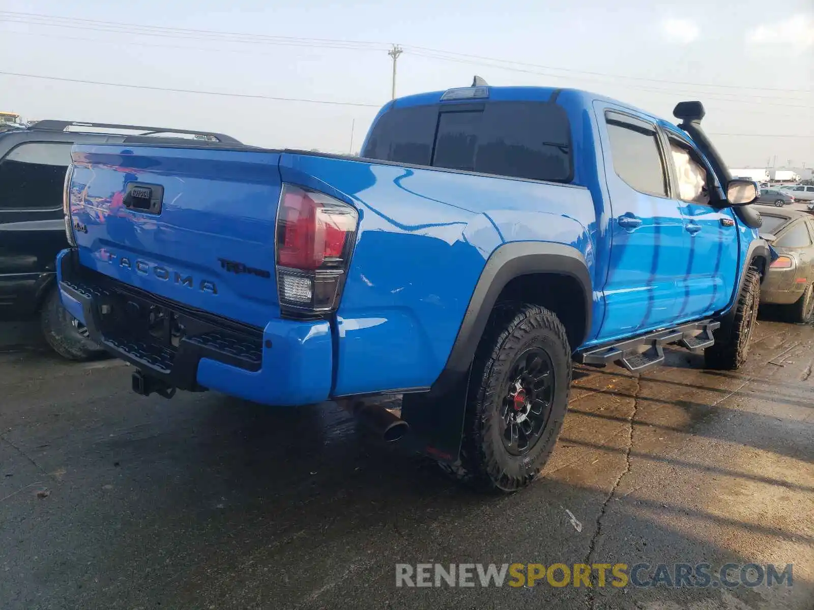 4 Photograph of a damaged car 5TFCZ5AN7KX165967 TOYOTA TACOMA 2019