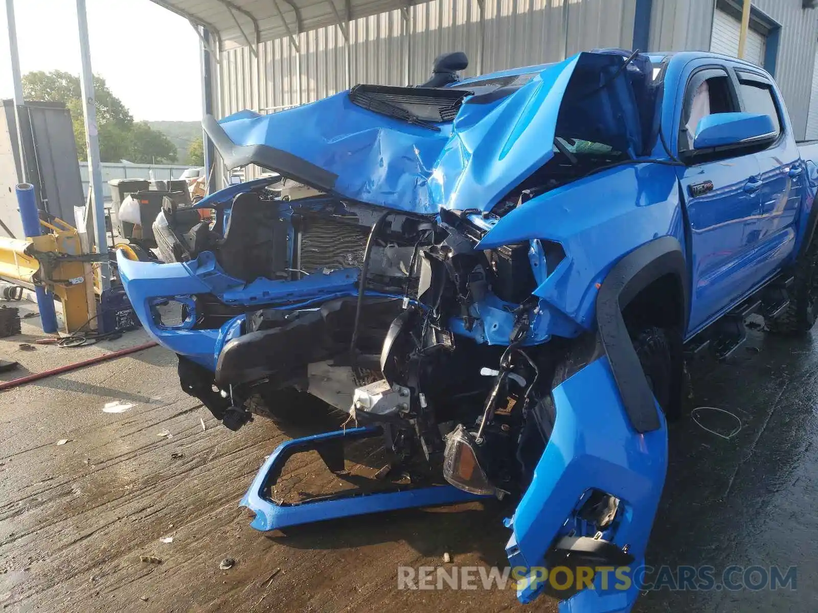 9 Photograph of a damaged car 5TFCZ5AN7KX165967 TOYOTA TACOMA 2019