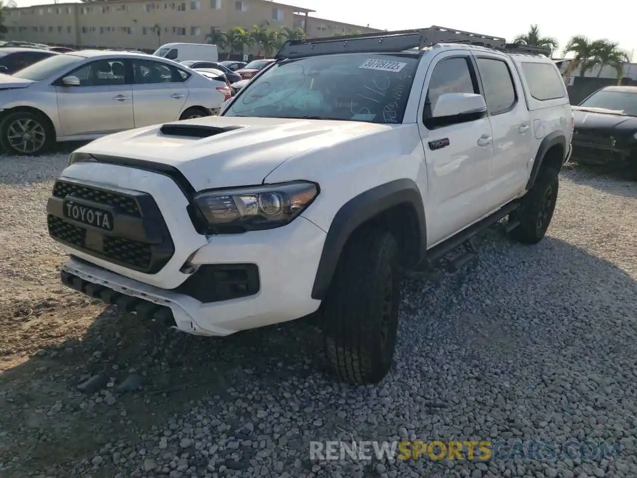 2 Photograph of a damaged car 5TFCZ5AN7KX175110 TOYOTA TACOMA 2019