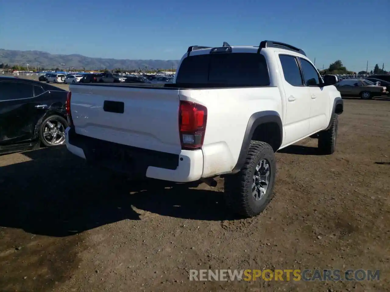 4 Photograph of a damaged car 5TFCZ5AN7KX175690 TOYOTA TACOMA 2019