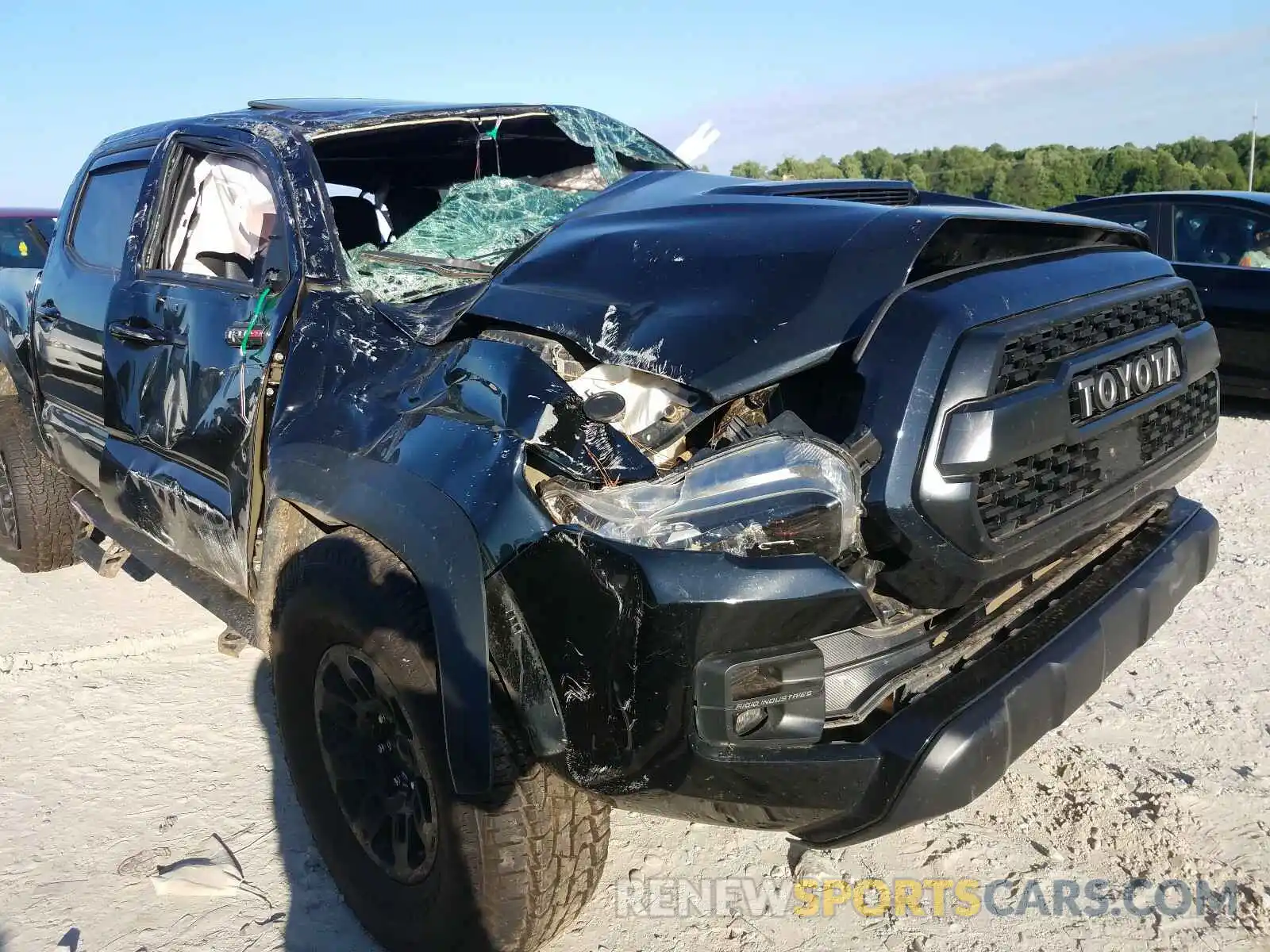 9 Photograph of a damaged car 5TFCZ5AN7KX177343 TOYOTA TACOMA 2019