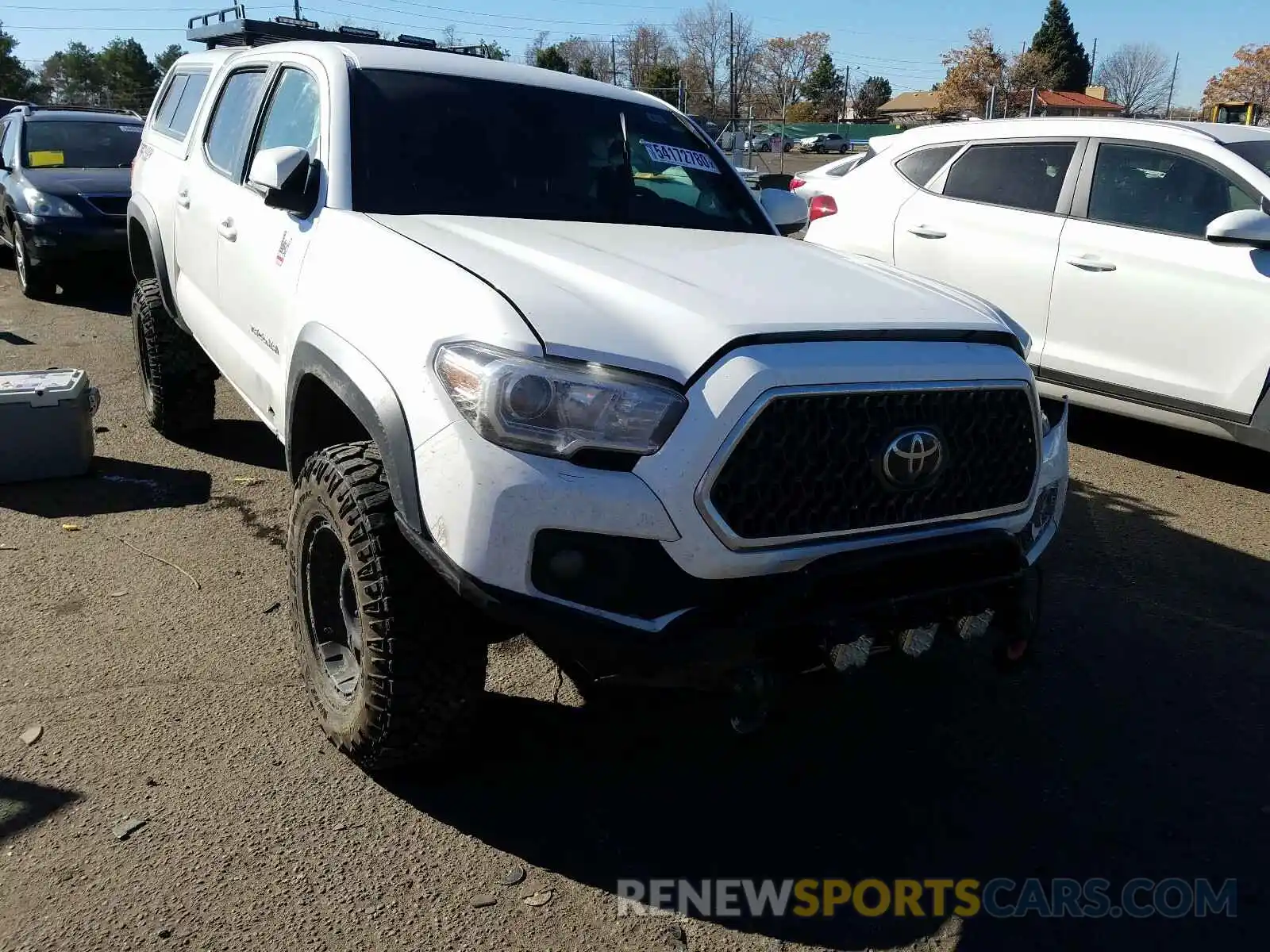 1 Photograph of a damaged car 5TFCZ5AN7KX179612 TOYOTA TACOMA 2019