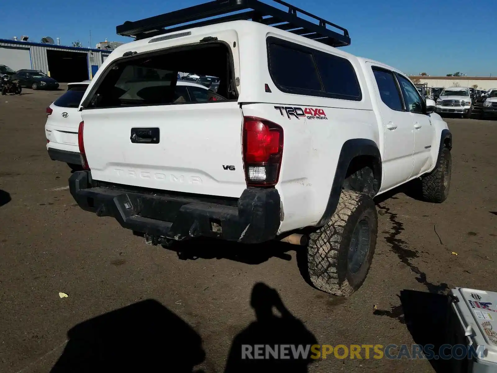 4 Photograph of a damaged car 5TFCZ5AN7KX179612 TOYOTA TACOMA 2019