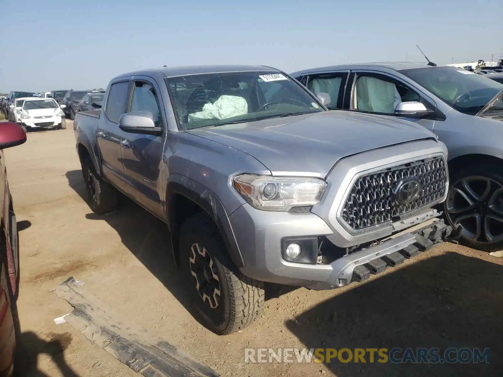 1 Photograph of a damaged car 5TFCZ5AN7KX181490 TOYOTA TACOMA 2019