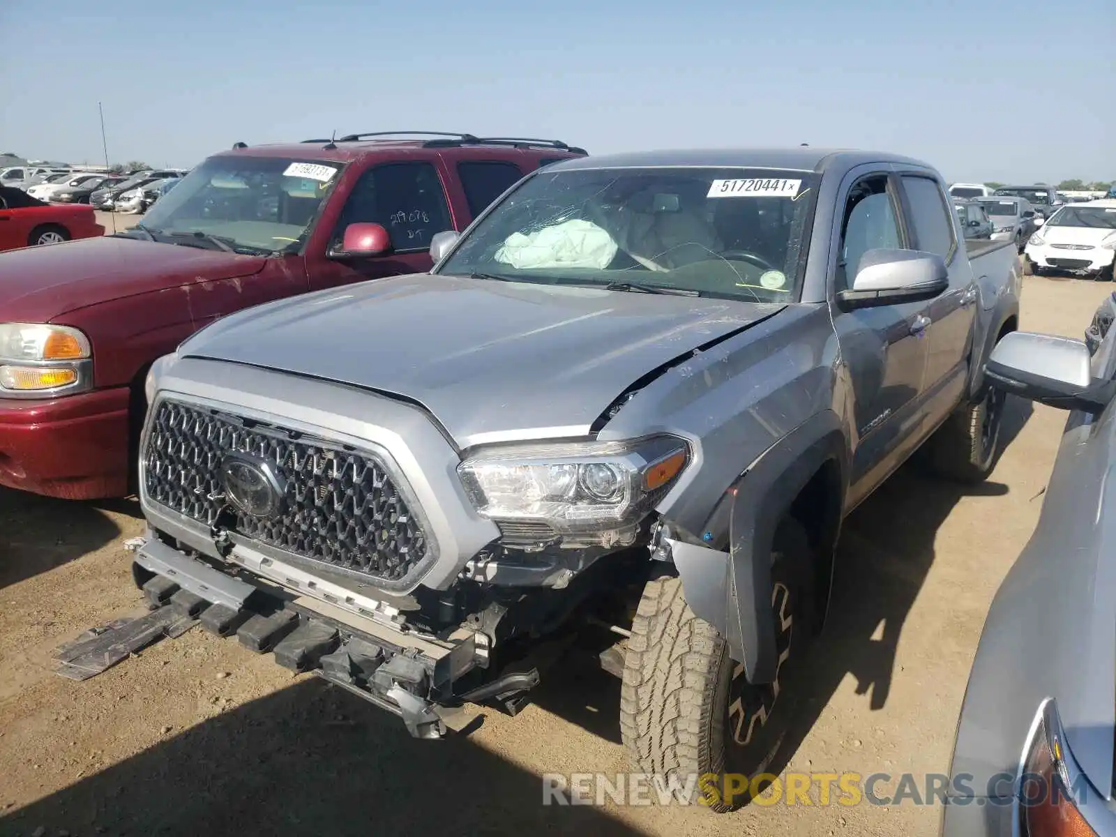 2 Photograph of a damaged car 5TFCZ5AN7KX181490 TOYOTA TACOMA 2019