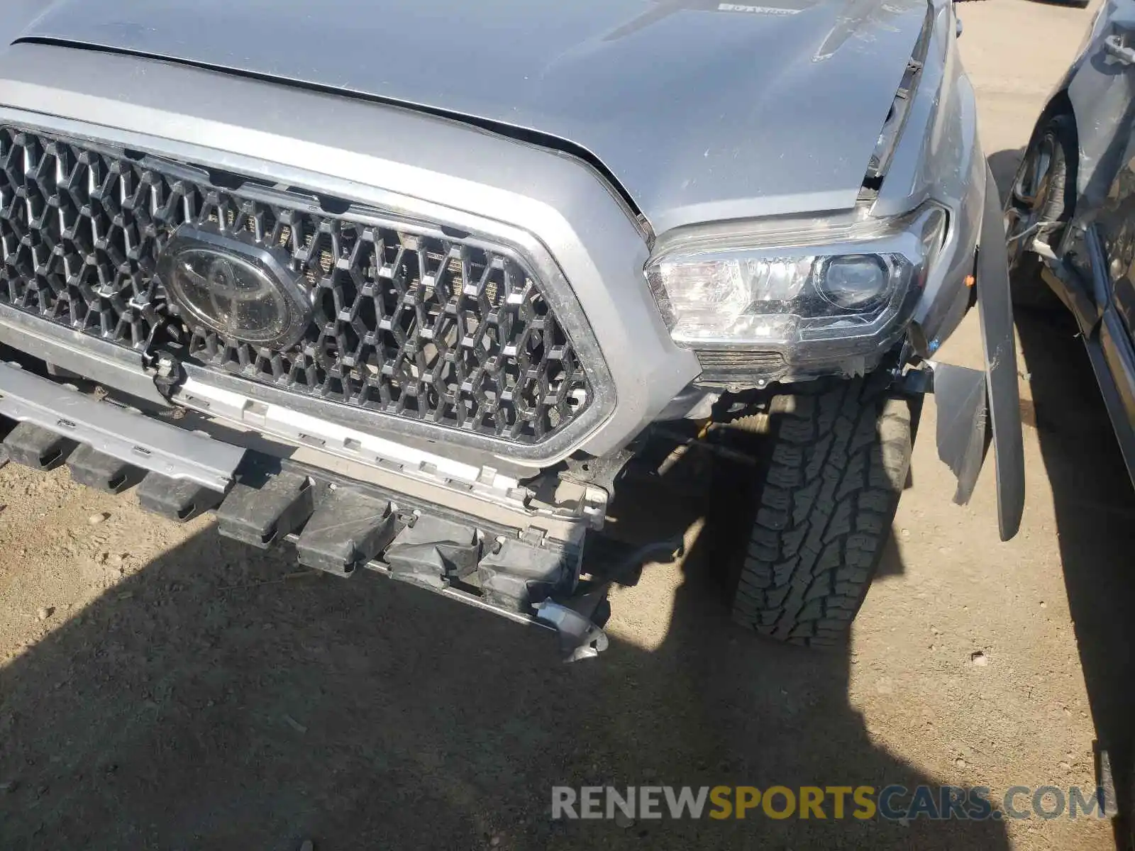 9 Photograph of a damaged car 5TFCZ5AN7KX181490 TOYOTA TACOMA 2019